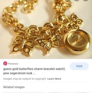 Guess butterfly charm gold bracelet watch